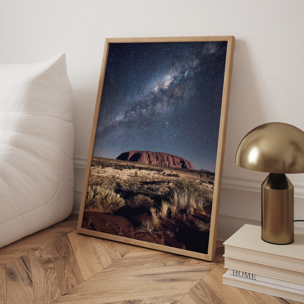 Uluru Under the Milky Way - Art Print by Beau Micheli, Poster, Stretched Canvas or Framed Wall Art Prints, shown framed in a room